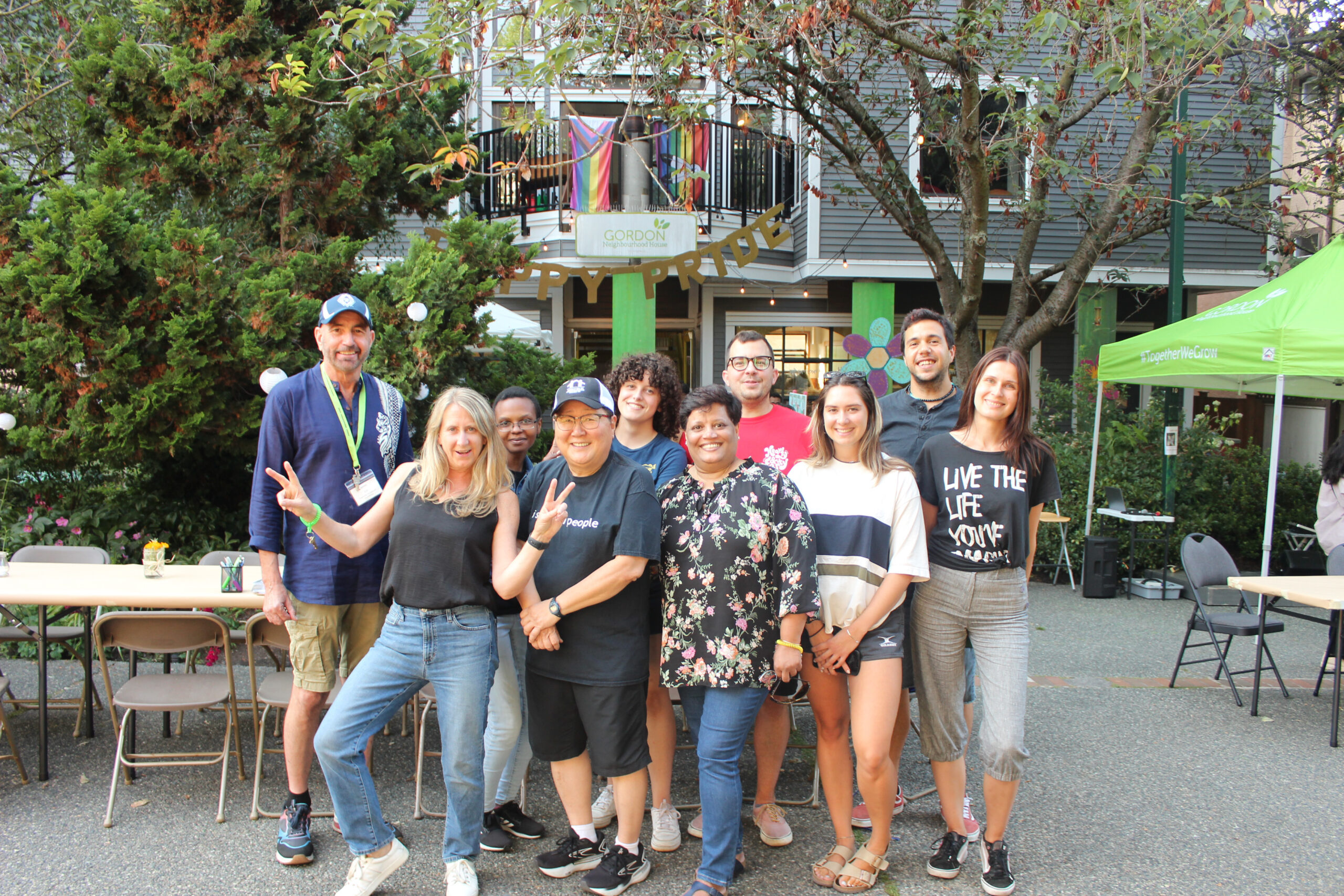 GNH team standing in front of the house